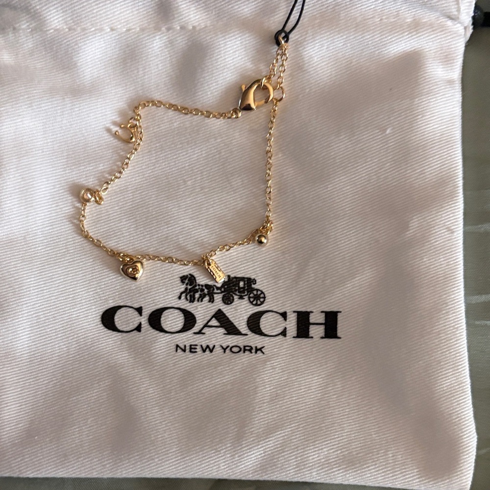Coach 14k Gold plated Charm Bracelet